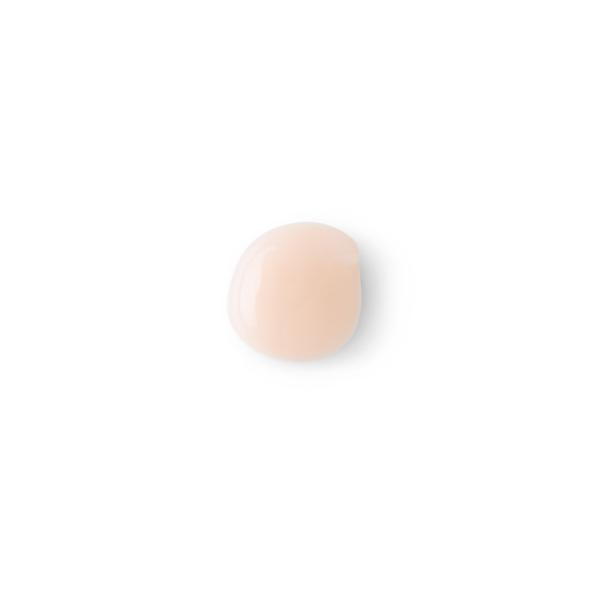 Close-up of the Men's Instant Facelift serum texture — a soft blush-toned gel droplet