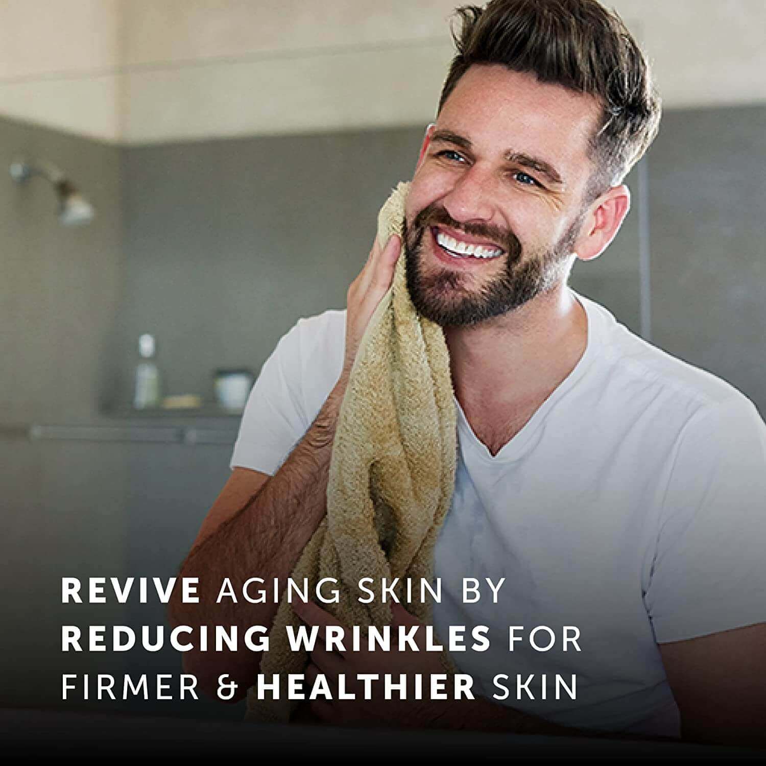 Man towelling his face — revive ageing skin by reducing wrinkles for firmer, healthier skin