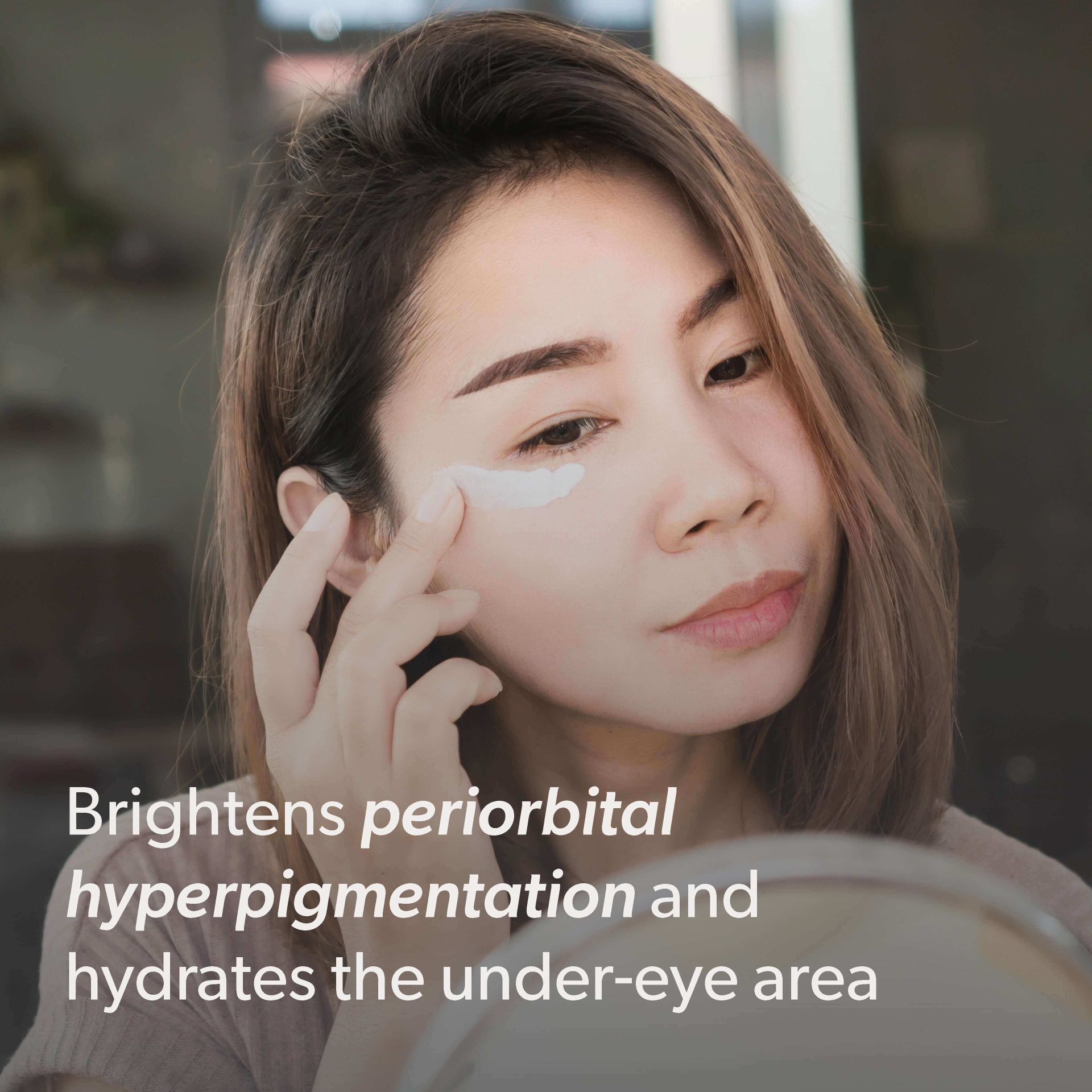Applying DCX eye cream to brighten the under-eye area